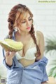 Mon 2K (Tran Ngoc Anh) poses sexy with durian fruit (15 photos)